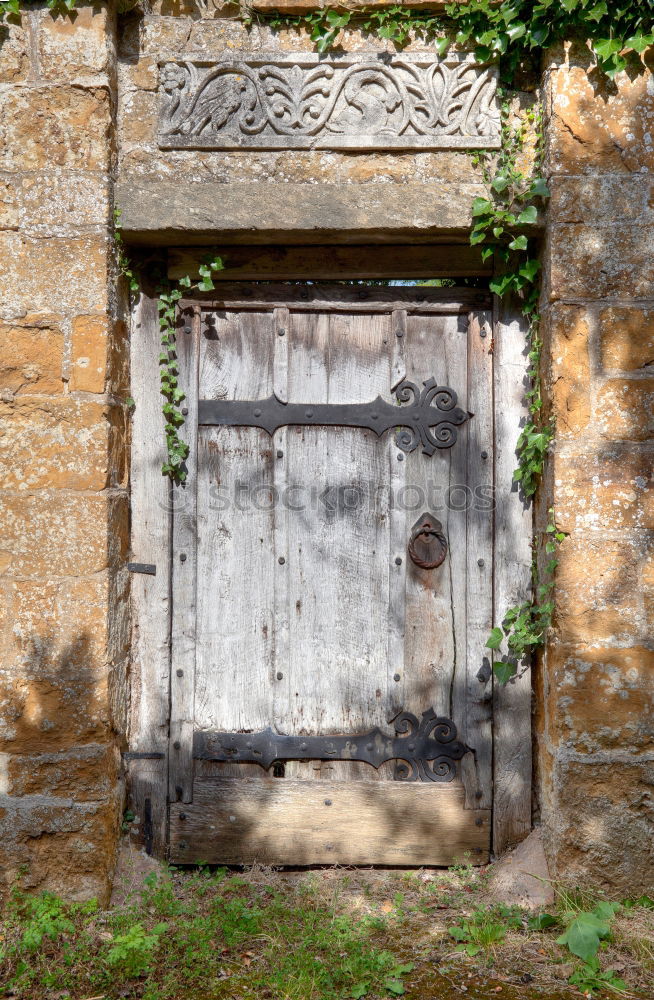 Similar – Locked door with hood