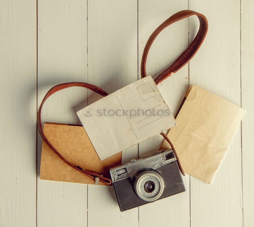 Similar – Image, Stock Photo Old vintage film camera in a leather case