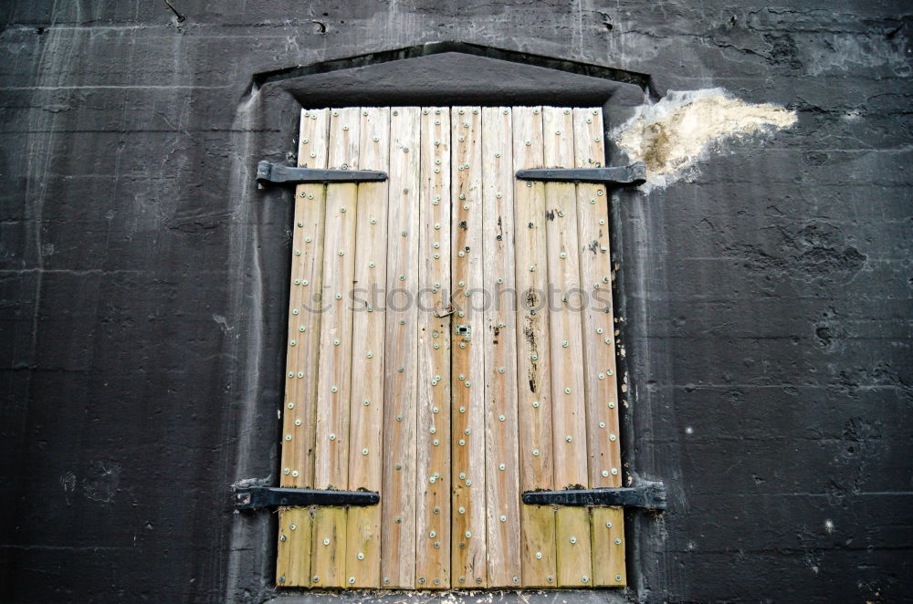 Similar – Red fire exit door in a dirty New York alley way.