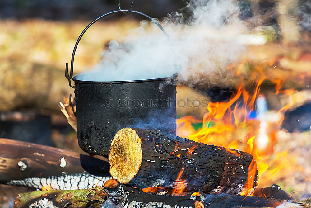 Similar – Hot coals with smoke in grill