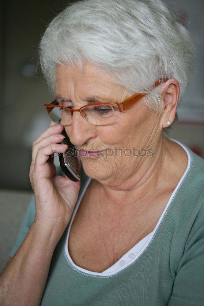 Similar – Image, Stock Photo Elderly woman on the mobile phone at home