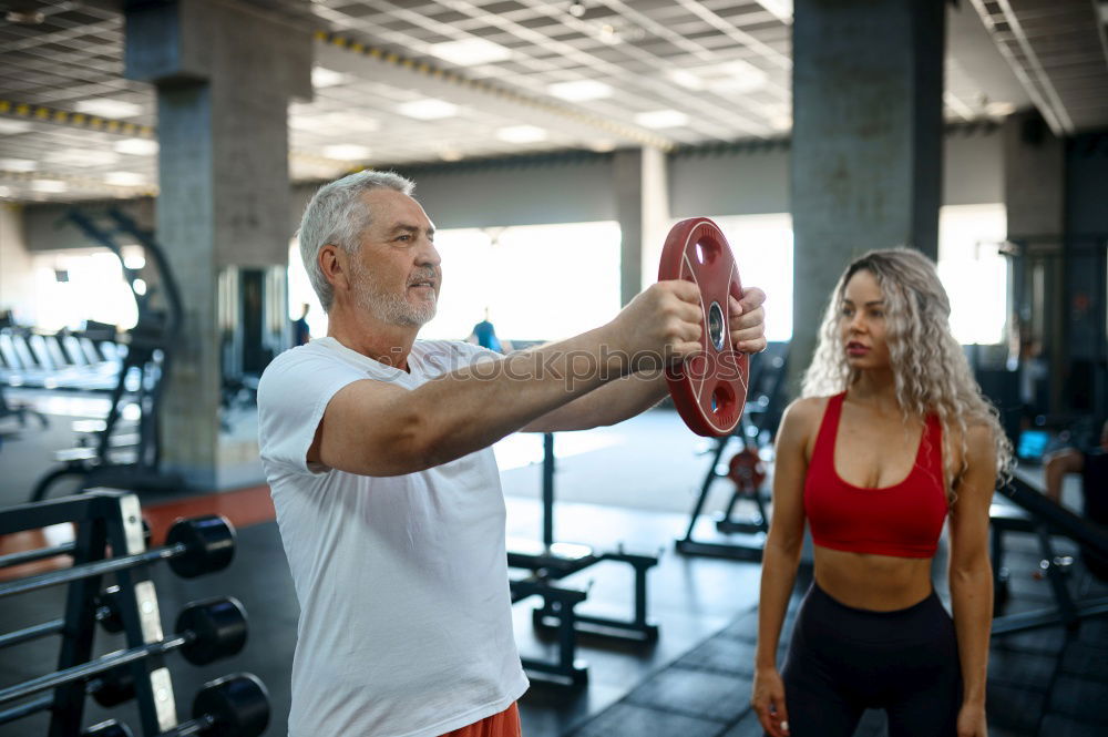 Similar – Image, Stock Photo Woman trainer teaching fitness exercises to class