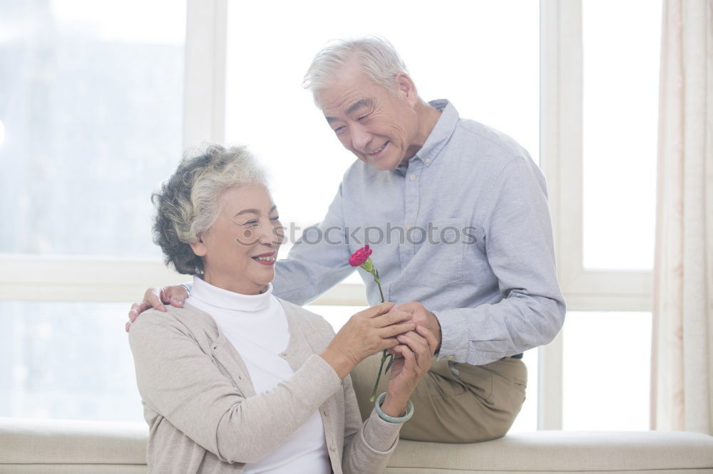 Similar – young man and old woman talking during a walk