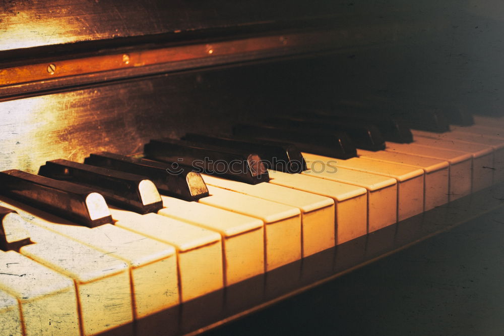 Similar – Image, Stock Photo old piano with a lot of white keys and black ones in the spaces in between