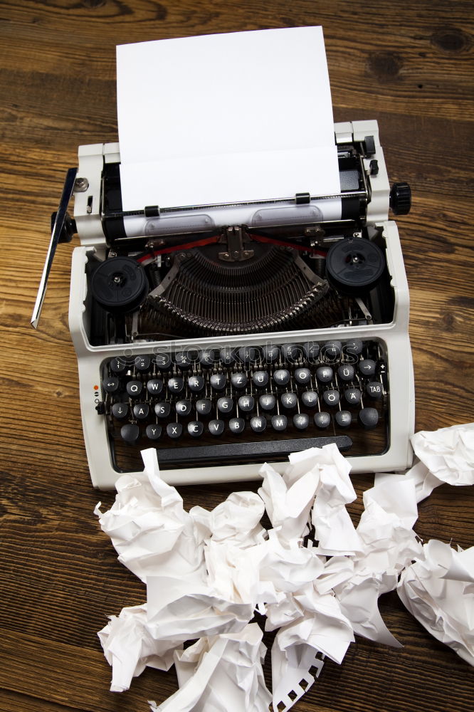 Similar – Text prescribed on a vintage typewriter and watch timekeeper.