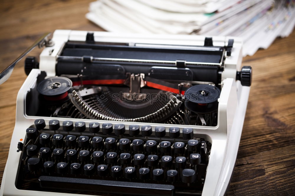 Similar – Text prescribed on a vintage typewriter and watch timekeeper.