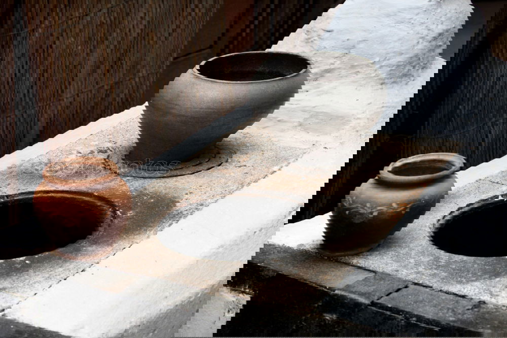 Similar – Image, Stock Photo In the pottery workshop, the finished beautiful figure of a woman in a cape.