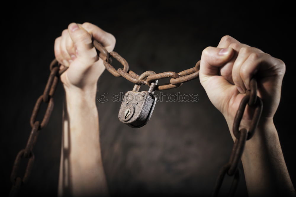 Similar – Image, Stock Photo Man holding motorcycle chains