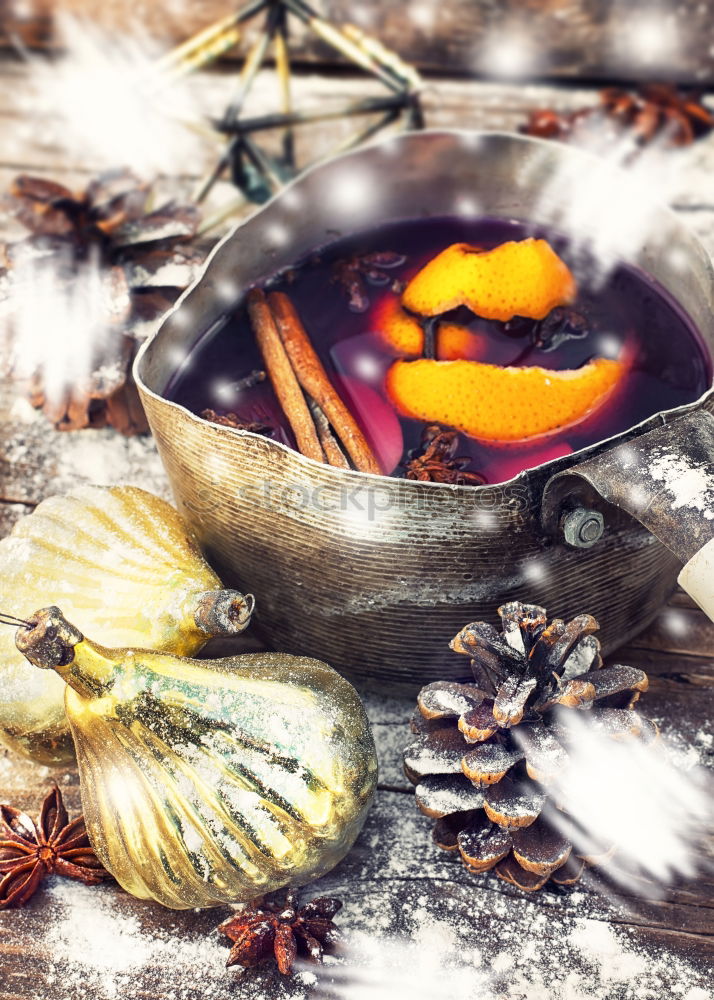 Similar – Christmas background with mulled wine and spices