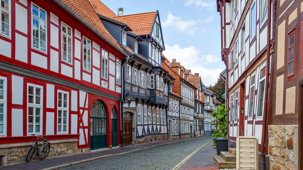 Image, Stock Photo AST 9 | Today we celebrate! Half-timbered houses decorated with white red flags