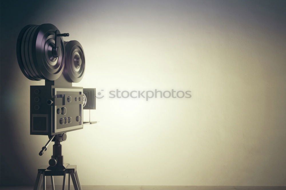 Similar – Hand holding a Vintage camera isolated at pink wall