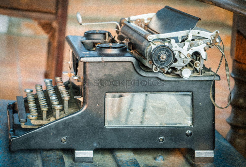 Similar – Carburetors for a car engine with tools on wooden table