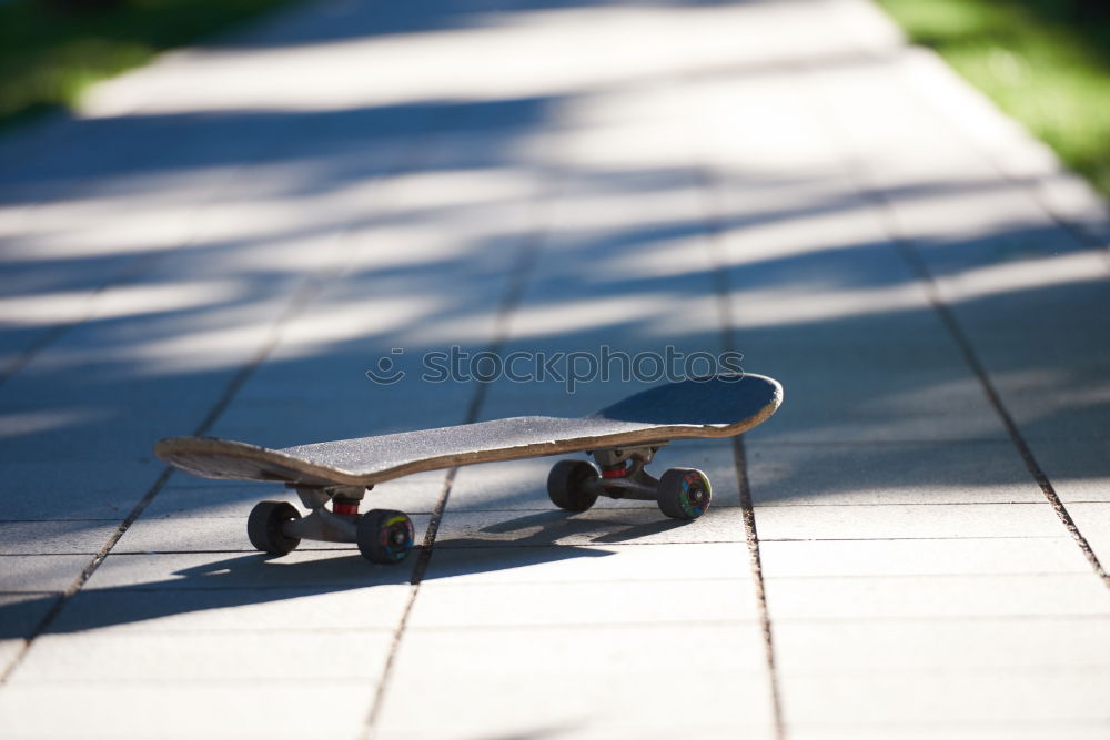 Similar – Image, Stock Photo Old used skateboard over the ground