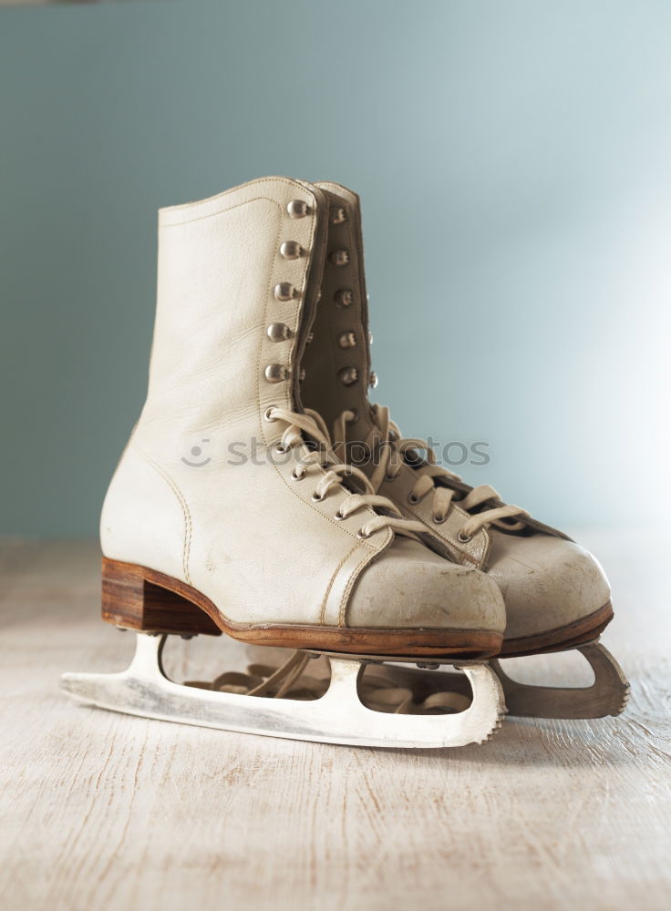 Similar – A pair of roller skates on the sidewalk.