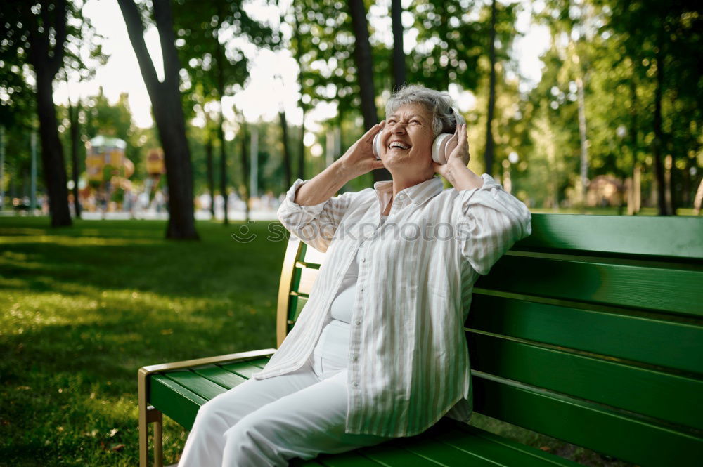 Similar – Senior citizen looks up in the forest