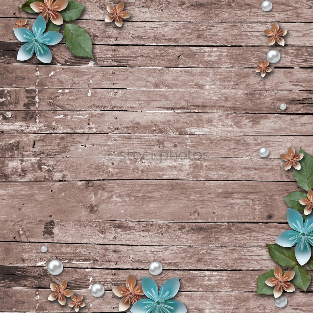 Similar – a paper picture with a rippled edge from the 1960s with a toddler in a pram lies on a wooden board next to leaves