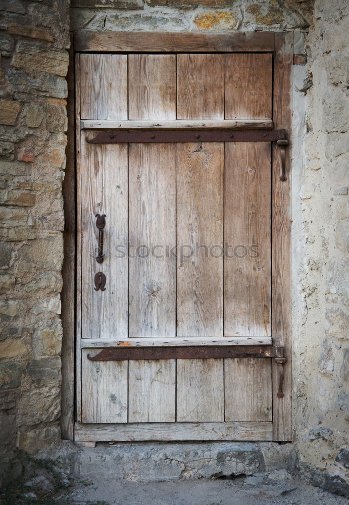 Similar – Locked door with hood