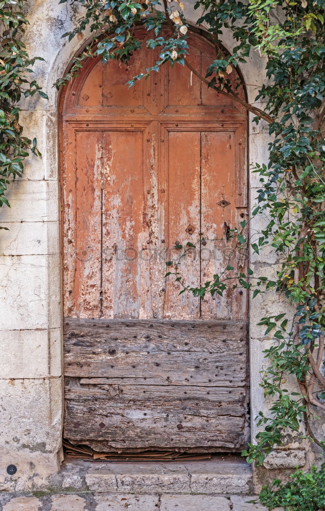 Similar – Small stool with blanket, standing in front of blue door, in the medina.