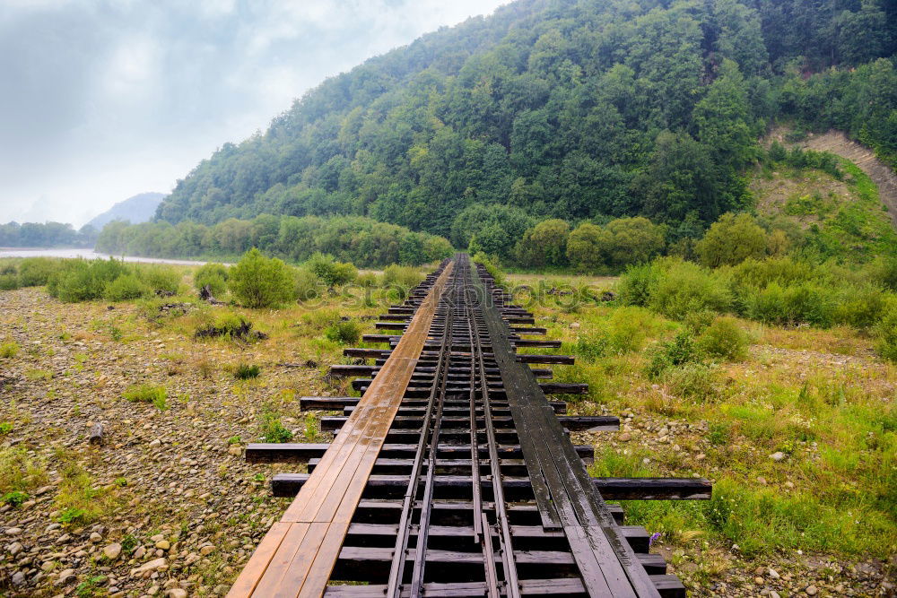 Similar – schienen Gleise Pfütze