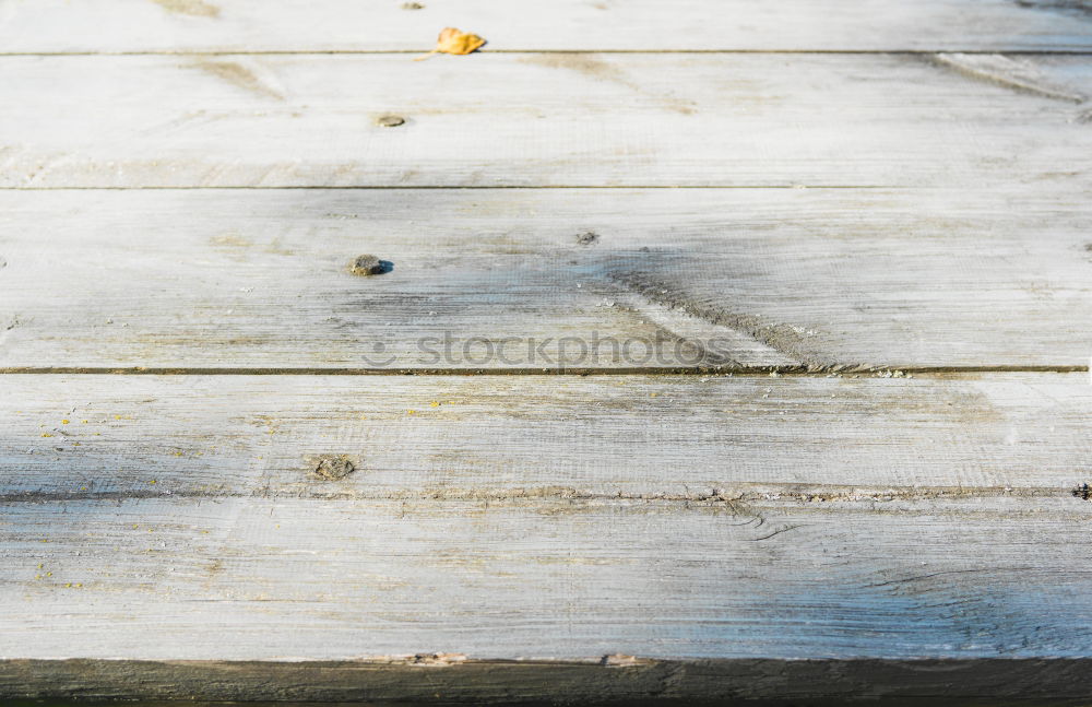 Similar – Pliers and twine on a plank with old rusty nail