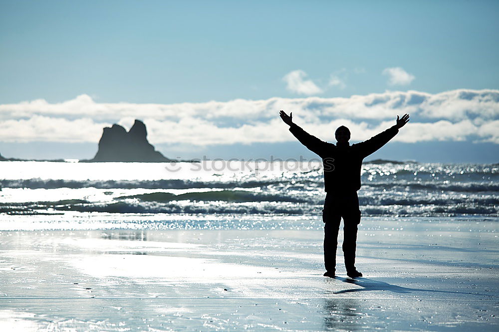 Similar – Image, Stock Photo Diver in wet suit standing on beach