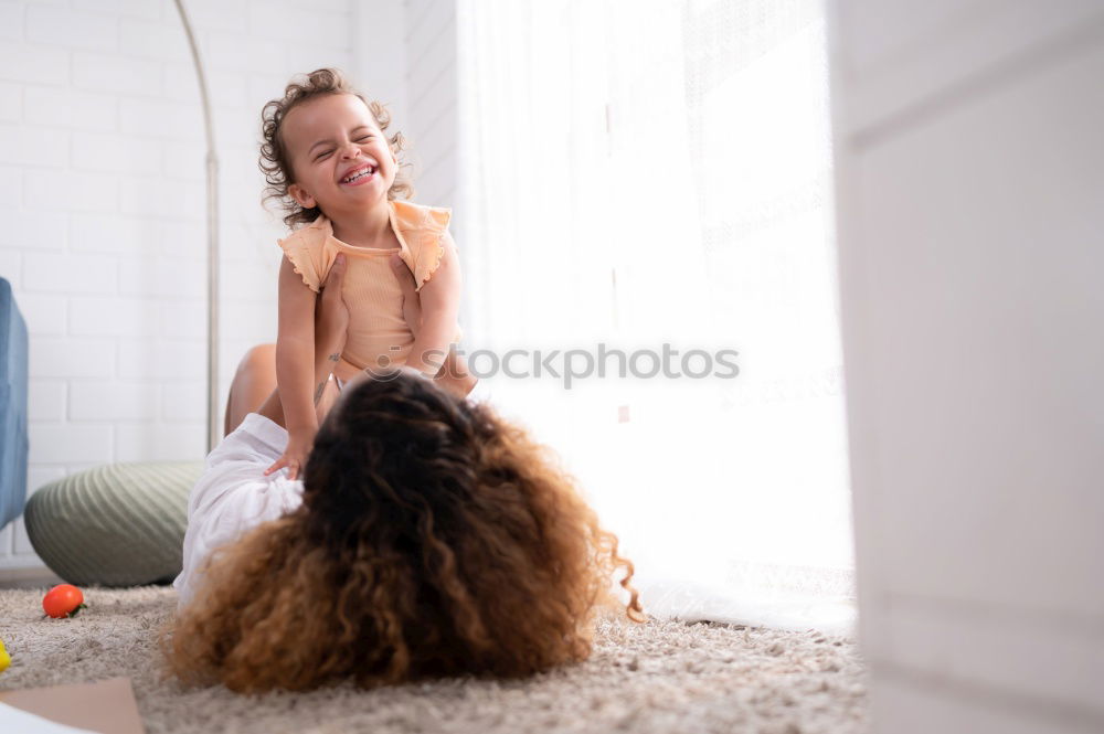 Similar – Image, Stock Photo African girl sits next to her teddy bear at home