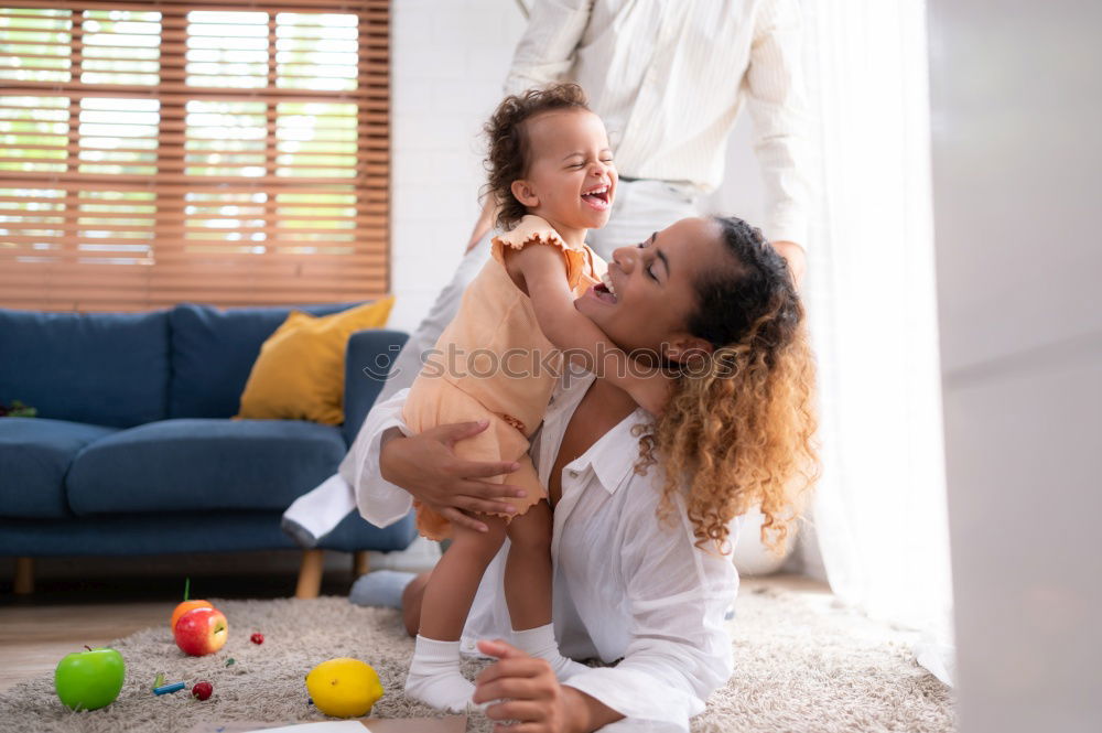 Similar – Image, Stock Photo Happy Mother tickling her cute toddler son at home