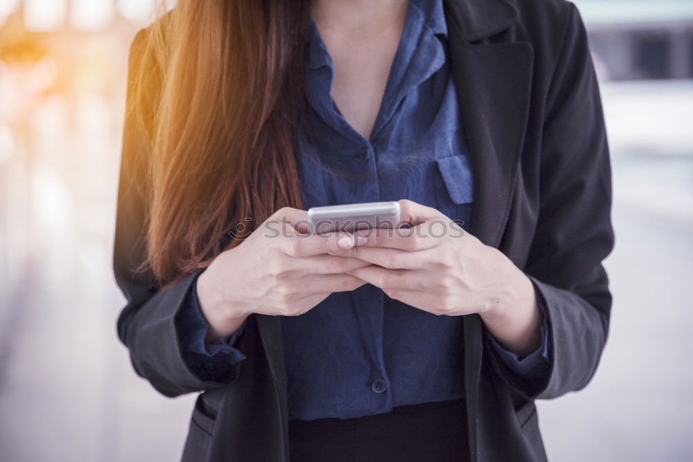 Similar – Image, Stock Photo Fashionable young woman reading a SMS