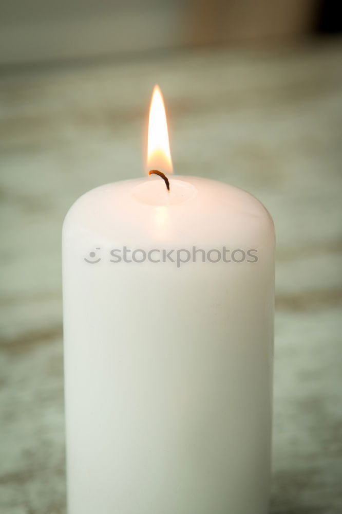 Similar – Image, Stock Photo Burning candle in a candle glass on a light wooden background. Weak depth of field