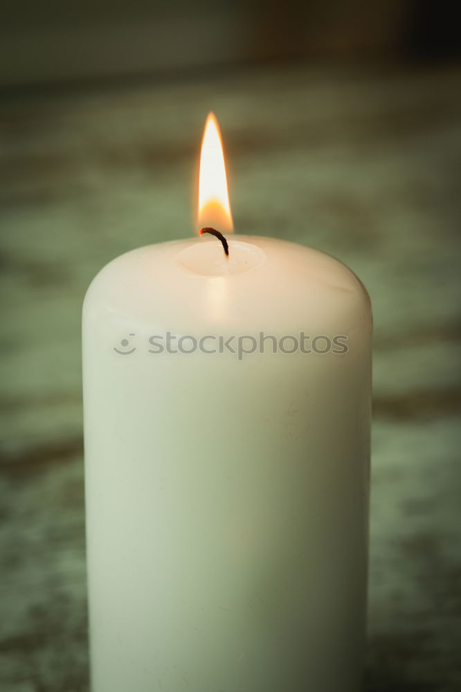 Similar – Image, Stock Photo Burning candle in a candle glass on a light wooden background. Weak depth of field