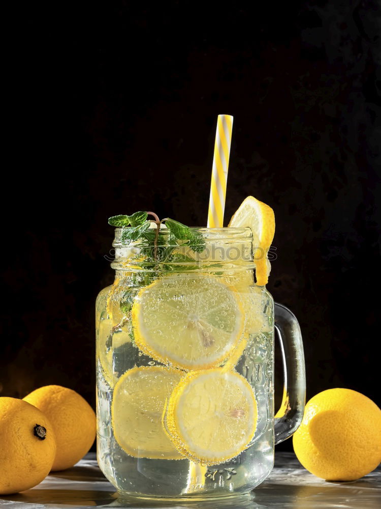 Similar – Image, Stock Photo Homemade refreshing drink with lemon juice and mint