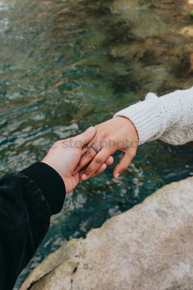 Similar – Image, Stock Photo Couple embracing on evening street