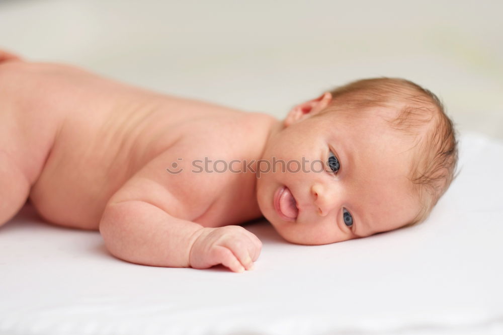 Baby with one years old getting out of bed