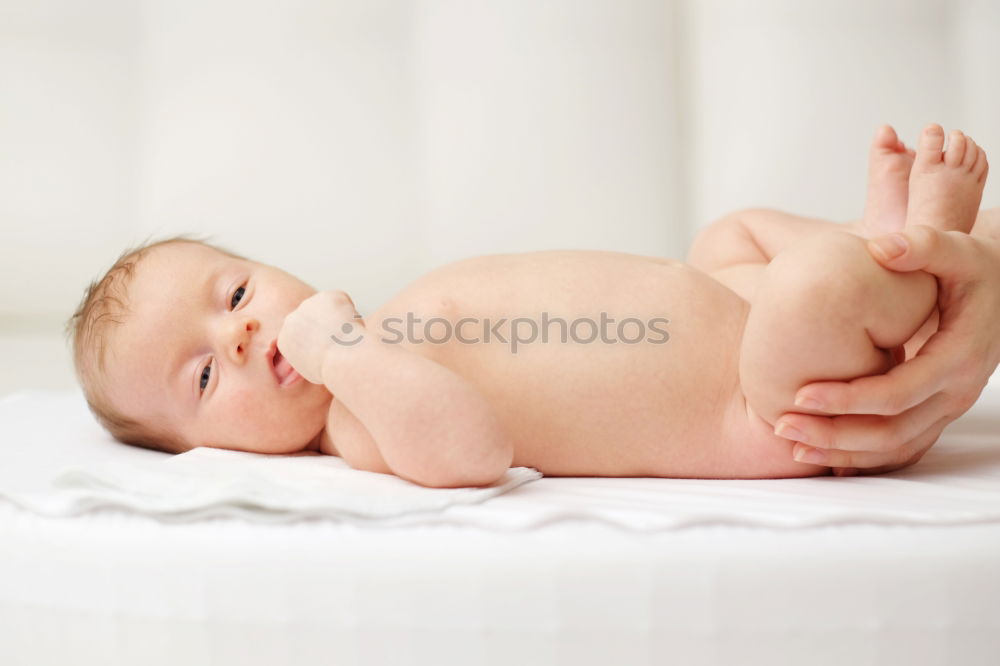 Cute Baby Girl Lying in the Baby Changer.