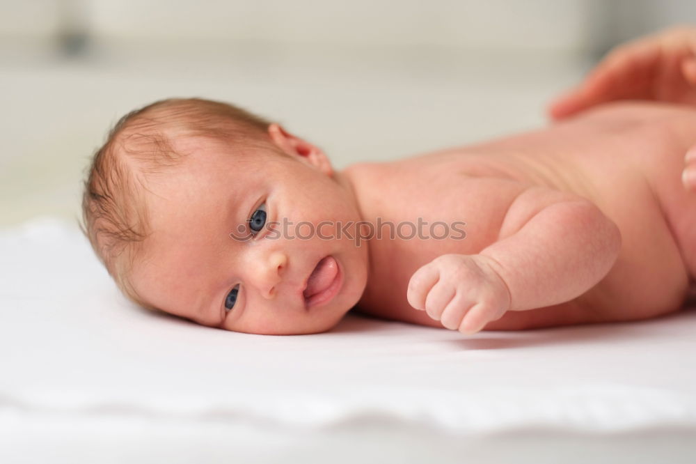 Similar – Image, Stock Photo newborn baby experiencing the world