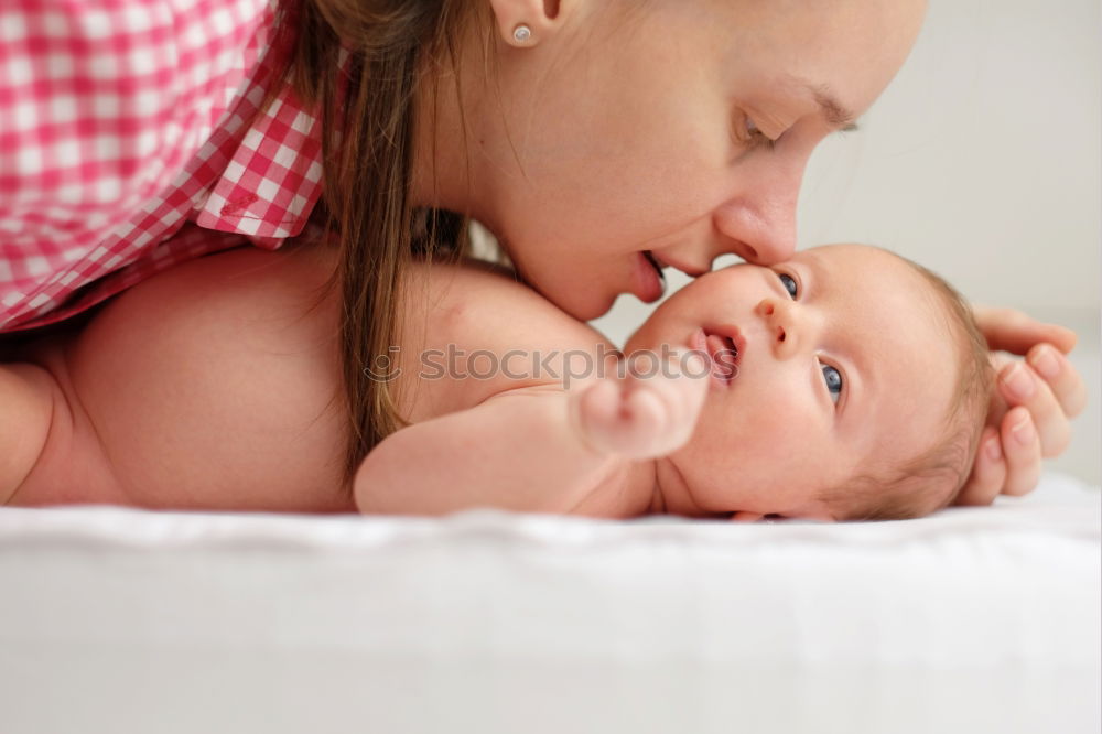 Similar – Father holding newborn baby son at the day time. Concept of happy family.