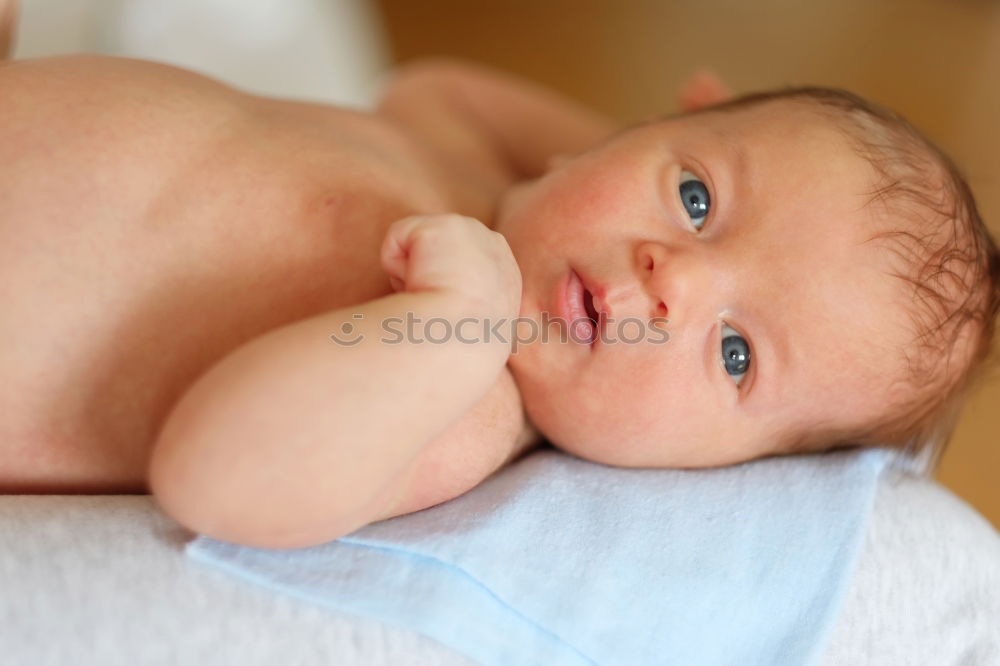 Similar – Image, Stock Photo newborn baby experiencing the world