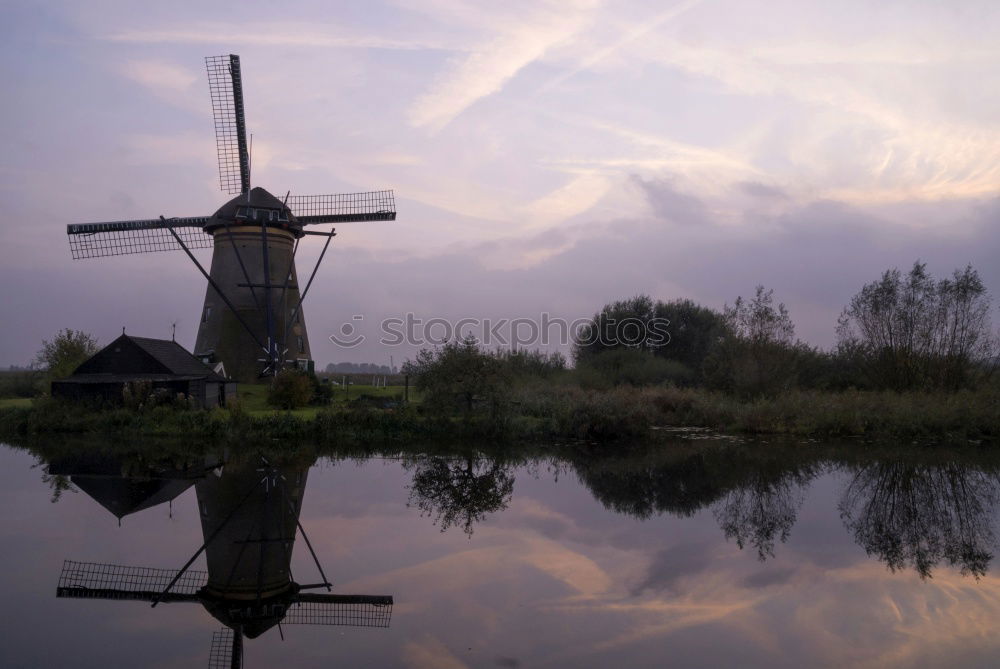 Similar – Image, Stock Photo charming windmill by lake at misty sunrise