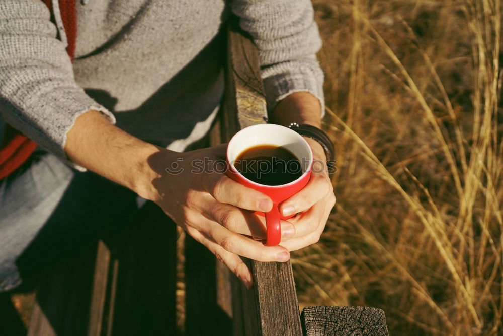 Image, Stock Photo One people holding a cup of coffee or soluble cereals