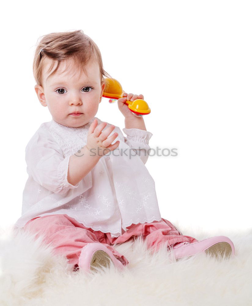 Similar – Image, Stock Photo Baby girl two months old looking at a doll