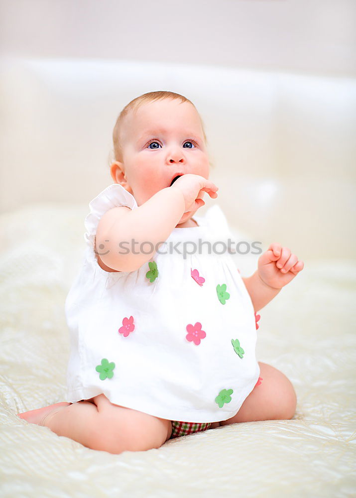 Similar – Image, Stock Photo portrait of a beautiful baby girl at home. Family concept indoor