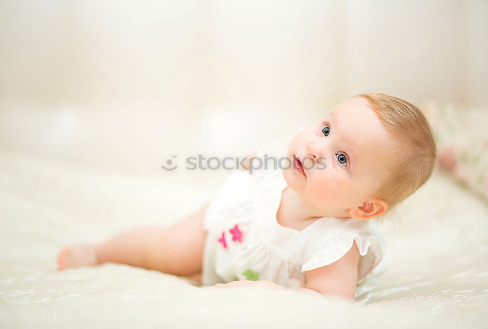 Similar – Image, Stock Photo Portrait of newborn baby lying down over a blanket