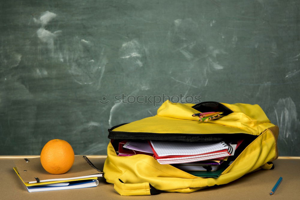 Similar – Der Knüller. Knüllpapier auf Schulbank im Klassenzimmer beim Unterricht