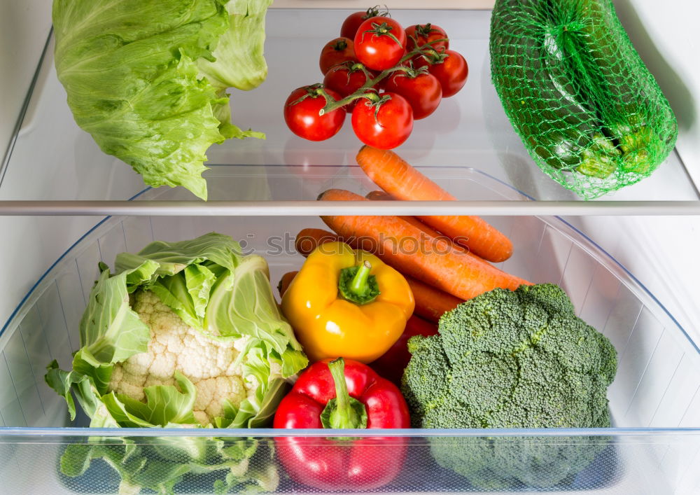 Similar – Green vegetables and greens in open refrigerator