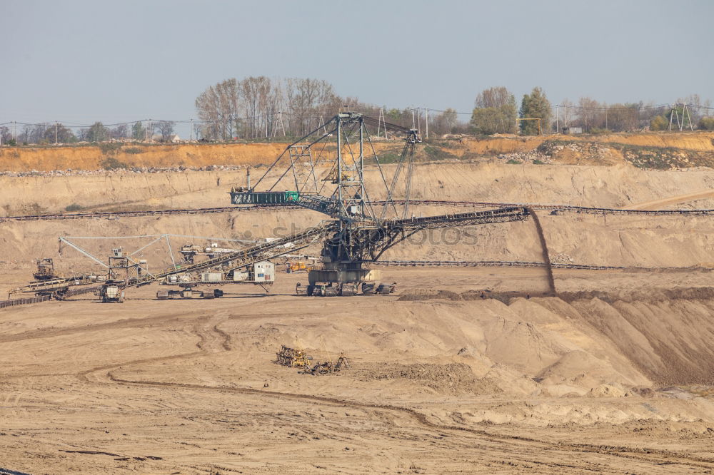 Similar – Opencast mining with conveyor crane