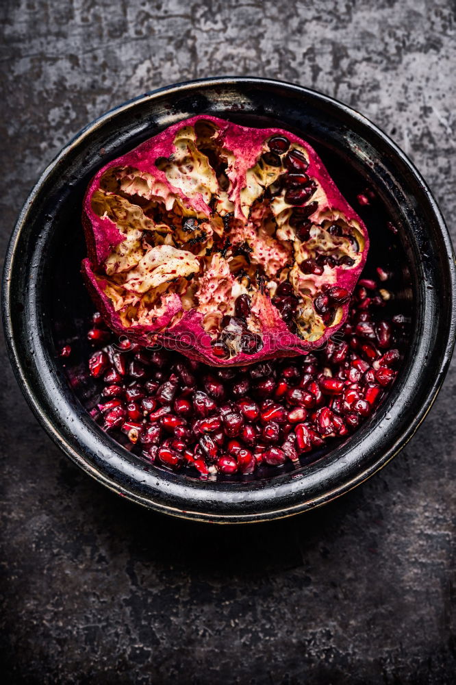 Image, Stock Photo Open pomegranate with seeds in a rustic bowl