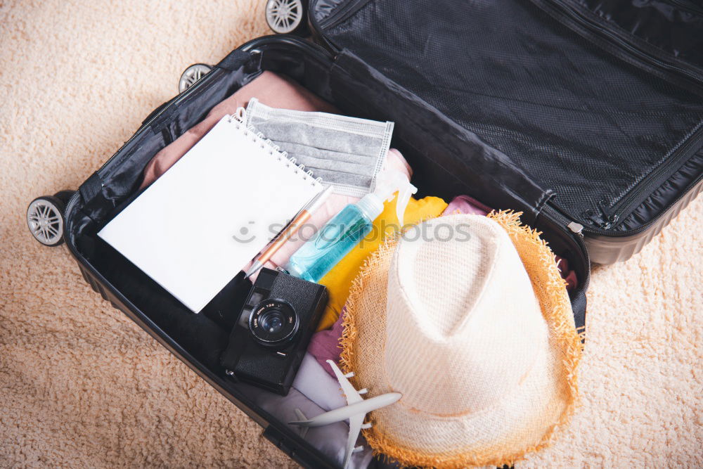 Similar – Image, Stock Photo Packed suitcase for the beach holiday