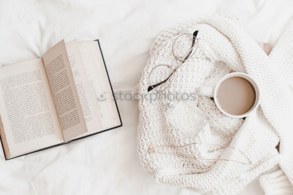 Similar – Image, Stock Photo woman reading a book and drinking coffee on bed with socks