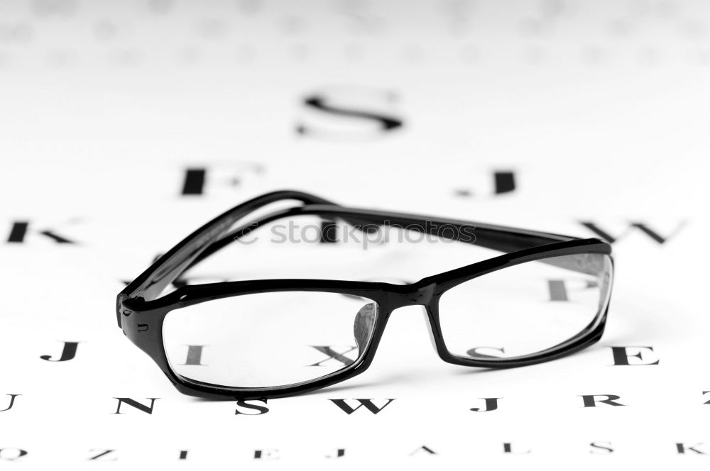 blank of letter paper and envelope with eyeglasses