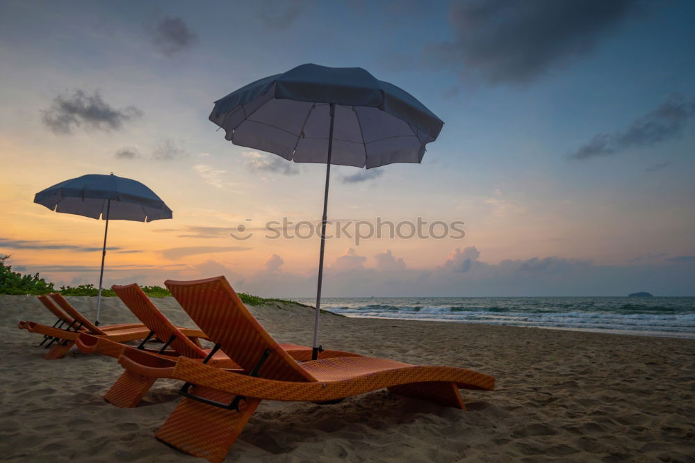 Similar – People ride their bicycles on the Baltic Sea beach at sunset